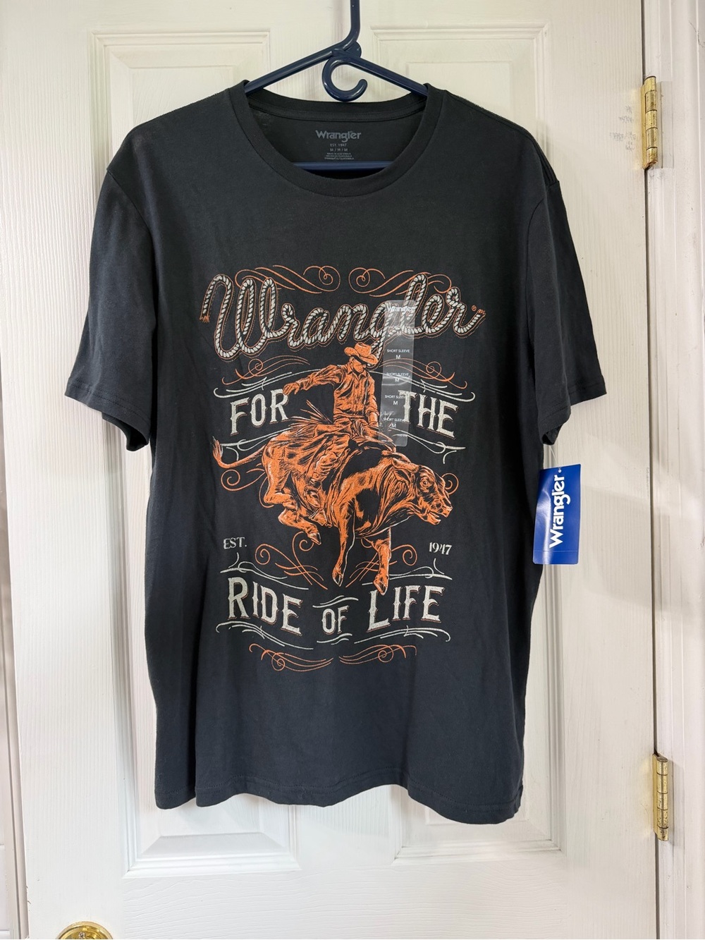 Wrangler Black Short-Sleeve Tee with Orange Rodeo Graphic